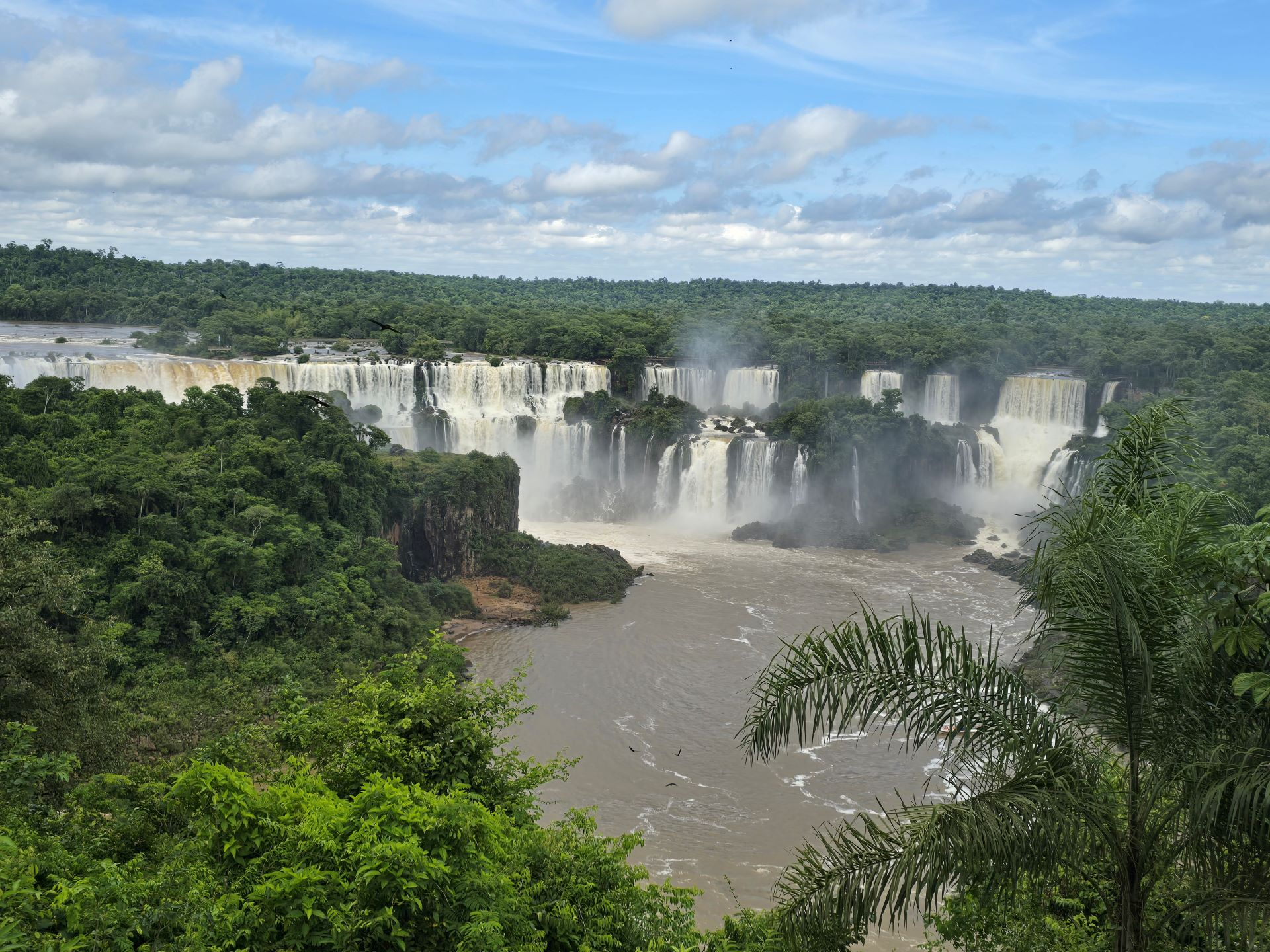 Planning to visit the Brazilian side of Iguazu Falls from Argentina? Discover what to expect, the border crossing process, best viewpoints, walking bridge experience, and essential travel tips for an unforgettable day trip.